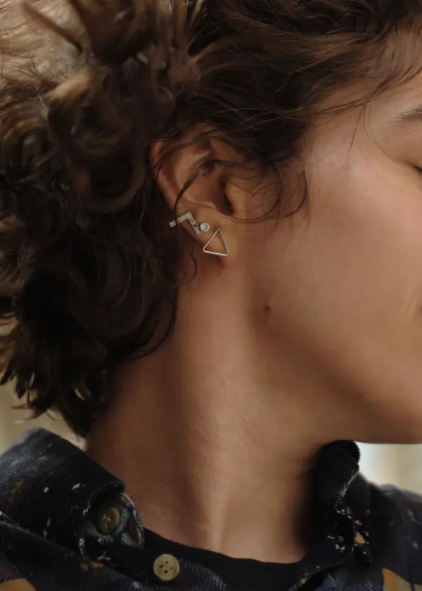 Smiling woman with earrings