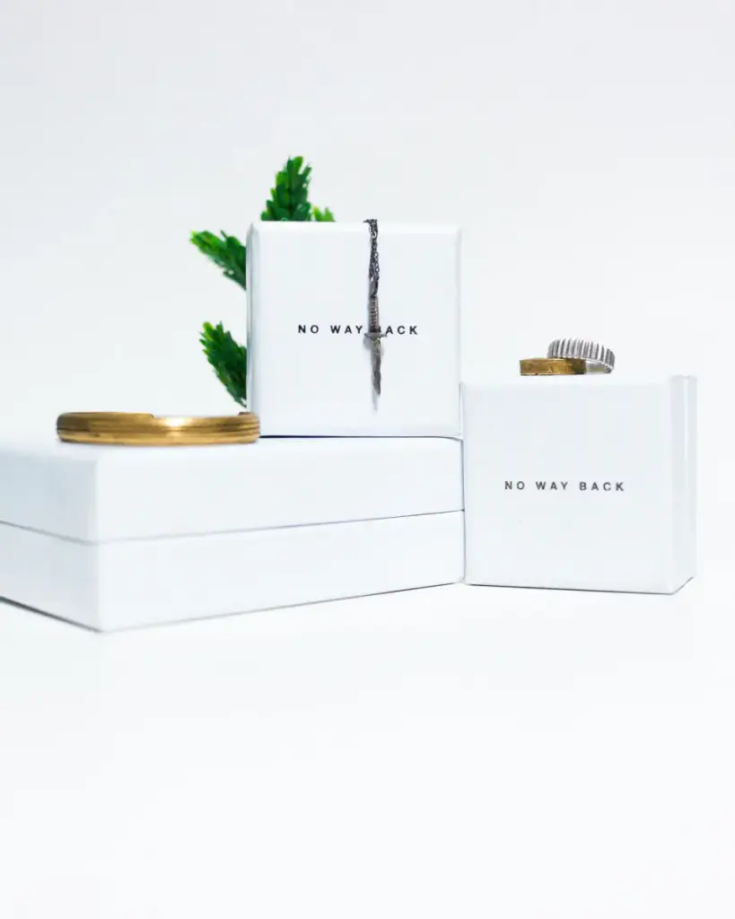 Rings on white gift boxes